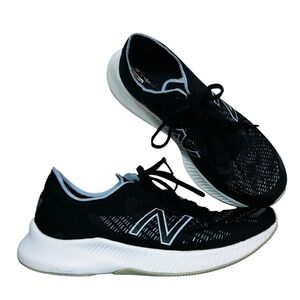 New Balance Black and Light Blue Sneakers